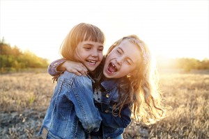 Two Girls Laughing