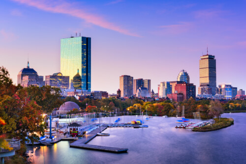 Boston Massachusetts skyline at sunset representing career opportunities for licensed psychologists in Massachusetts