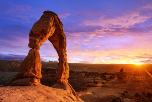 Delicate Arch at sunset in Utah, symbolizing career opportunities for psychologists in the Beehive State
