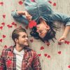 Couple Laying on the Ground Surrounded by Hearts | Sex Therapy | Careers in Psychology