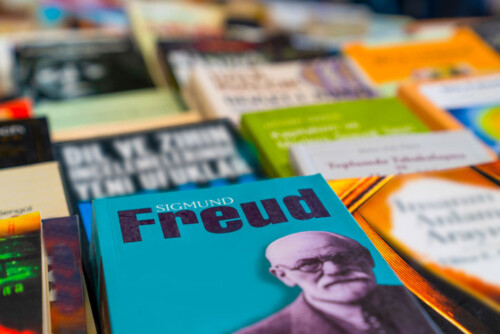 Sigmund Freud book among stack of others