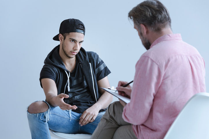 young man meeting professional